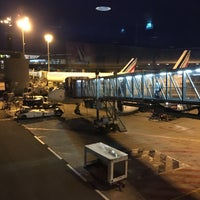 Photo taken at Gate E34 by Evgeny B. on 11/5/2015