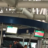 Photo taken at Alitalia Check-in by Carlos B. on 3/9/2015