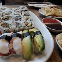 Photo taken at Sushi Cafe by Zach S. on 1/5/2019