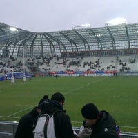 Photo taken at Stade des Alpes by Clément B. on 2/23/2013