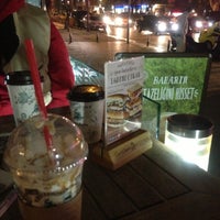 Photo taken at Caribou Coffee by Elif T. on 5/1/2013