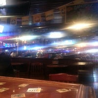 Photo taken at Arena Sports Grill by Samantha C. on 12/12/2012
