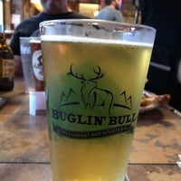 Photo taken at Buglin&#39; Bull Restaurant and Sports Bar by Mark N. on 7/31/2019