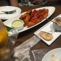 Photo taken at azabu Buffalo Wings by Ceyon K. on 5/13/2016