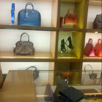Photo taken at Louis Vuitton by leny r. on 1/22/2013