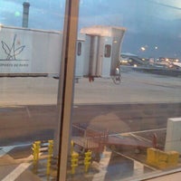Photo taken at Gate 61 by Ruslana K. on 12/15/2012