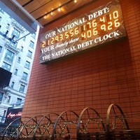 Photo taken at National Debt Clock by Jessica K. on 11/4/2018