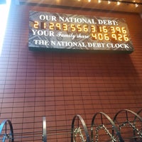 Photo taken at National Debt Clock by Jessica K. on 11/4/2018