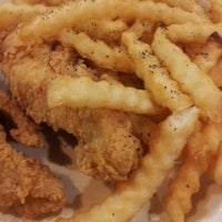 Photo taken at Raising Cane&amp;#39;s Chicken Fingers by Emmanuel L. on 12/15/2012