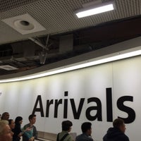 Photo taken at Arrivals Hall by AJ on 8/1/2015