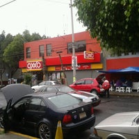 Photo taken at Oxxo by Andres M. on 6/20/2013