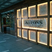 Photo taken at Astons Specialities by Sunny L. on 6/2/2013