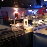 Photo taken at Umi Sushi + Tapas by Christin C. on 12/21/2012