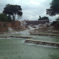 Photo taken at Waterfalls @ Hemisfair Park by Lucy S. on 5/31/2013