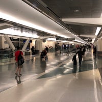 Photo taken at Gate A10 by Carlos S. on 7/25/2018