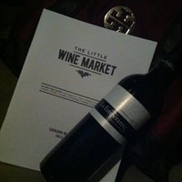Photo taken at The Little Wine Market by Aida I. on 12/16/2012