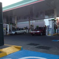 Photo taken at Gasolinera Tlalpan by Ernesto G. on 12/12/2012