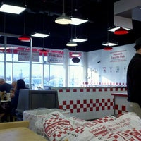 Photo taken at Five Guys by Lindy S. on 3/9/2013