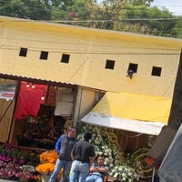 Photo taken at Mercado de Flores by Christopher d. on 10/28/2018