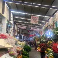 Photo taken at Mercado de Flores by Christopher d. on 12/3/2019