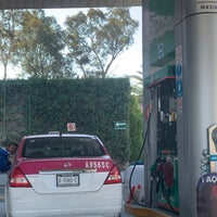 Photo taken at Gasolinera Cuemanco by Christopher d. on 3/8/2019