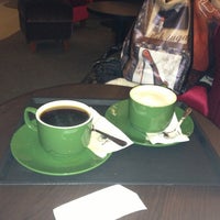 Photo taken at Pacific Coffee Company by Polis X. on 12/12/2012