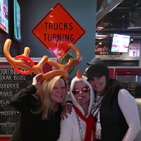 Photo taken at The Garage Burgers &amp;amp; Beers by Erin F. on 12/18/2016