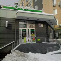 Photo taken at OTP Bank / ОТП Банк by Mike K. on 12/14/2012