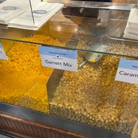 Photo taken at Garrett Popcorn Shops by H on 12/21/2022
