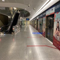 Photo taken at Telok Ayer MRT Station (DT18) by Jamie L. on 4/16/2022