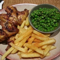 Photo taken at Nando&amp;#39;s by Dean B. on 9/30/2012