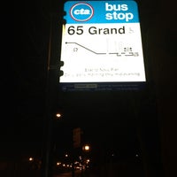 Photo taken at CTA Bus 65 by Alfredo M. on 12/14/2012