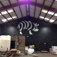 Photo taken at Striped Pig  Distillery by Erin O. on 11/23/2013