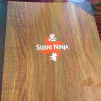 Photo taken at Sushi Ninja by Tanaka S. on 11/26/2013