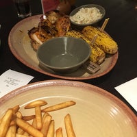 Photo taken at Nando&amp;#39;s by Elvyna L. on 5/4/2017