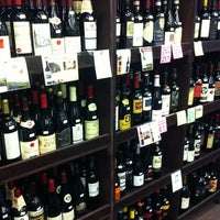 Photo taken at Irving Wine and Spirits by Jesse C. on 12/19/2012