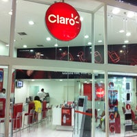Photo taken at Claro by Felipe S. on 12/22/2012