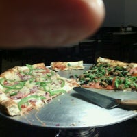 Photo taken at New York Pizza Kitchen by Gary V. on 12/19/2012