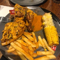 Photo taken at Nando&amp;#39;s by Rob N. on 10/15/2019