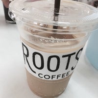 Photo taken at Roots Coffee Roaster by PRAE T. on 10/5/2015