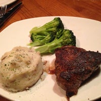 Photo taken at Outback Steakhouse by carlos v. on 5/14/2013