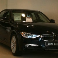 Photo taken at BMW АМС-Автолюкс by инна а. on 5/13/2013