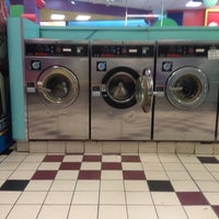 Photo taken at Bubbleland Laundromat by HalleB D. on 11/30/2011
