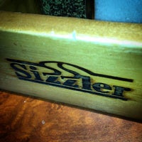 Photo taken at Sizzler by Aaron T. on 5/11/2016