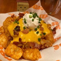 Photo taken at Hooters by Manami on 1/26/2020