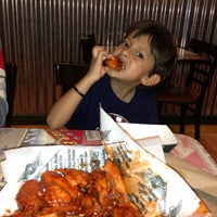 Photo taken at Wingstop by Julio O. on 5/3/2013