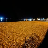 Photo taken at Lyme Regis Beach by Dave E. on 10/8/2021