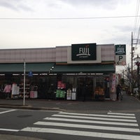 Photo taken at FUJI 百草園店 by 暖簾 on 12/26/2013
