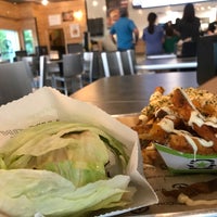 Photo taken at BURGERFI by Michelle Rose Domb on 8/11/2018