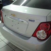 Photo taken at Américas Chevrolet by Luiza R. on 12/26/2012